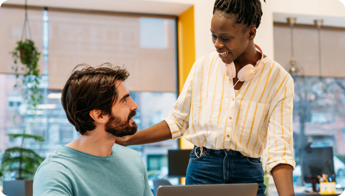 two people chatting at work