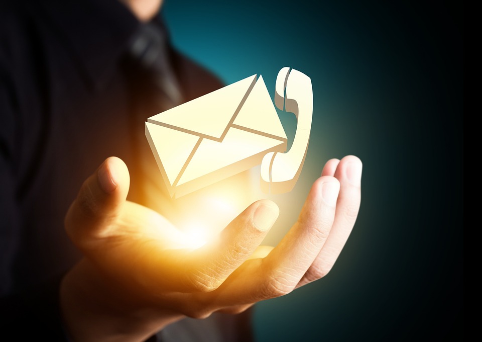 concept of someone juggling email and phone